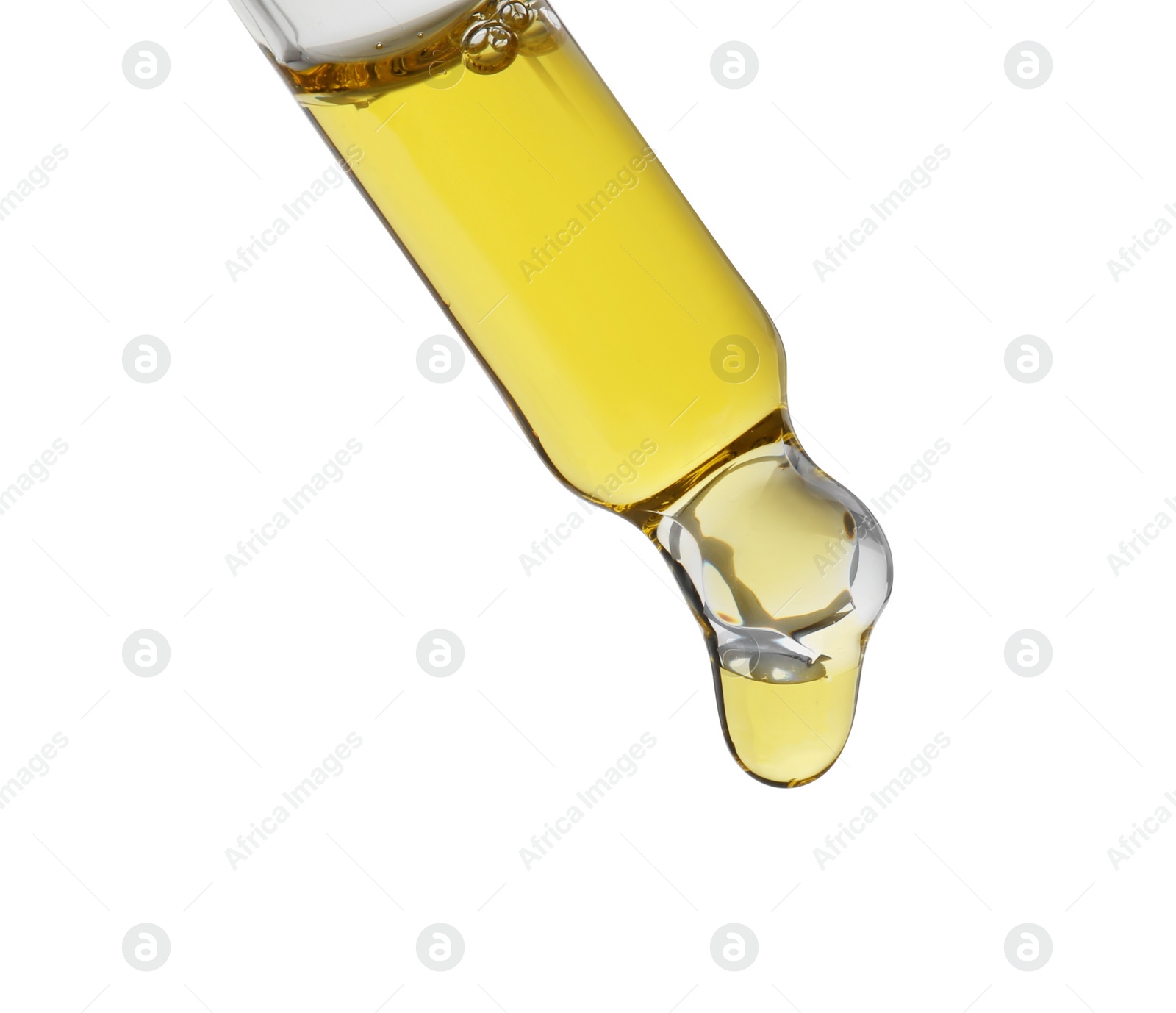 Photo of Dripping tincture from pipette isolated on white