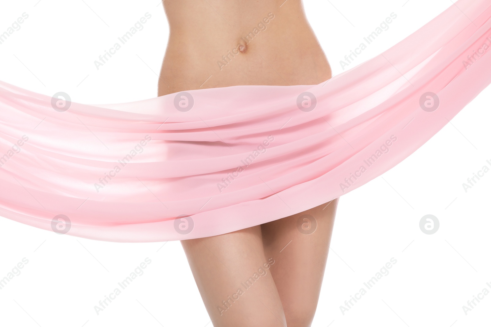 Photo of Slim young woman covered with silk fabric on white background, closeup. Fit body