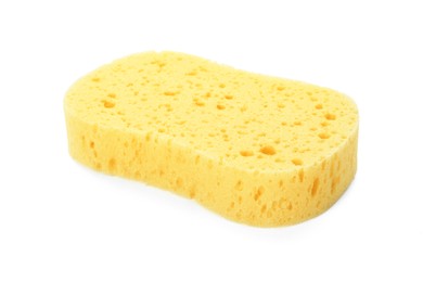 One new yellow sponge isolated on white