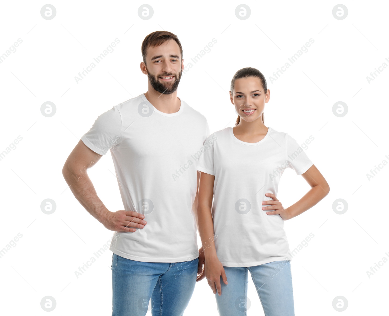 Photo of Young couple in t-shirts on white background. Mockup for design