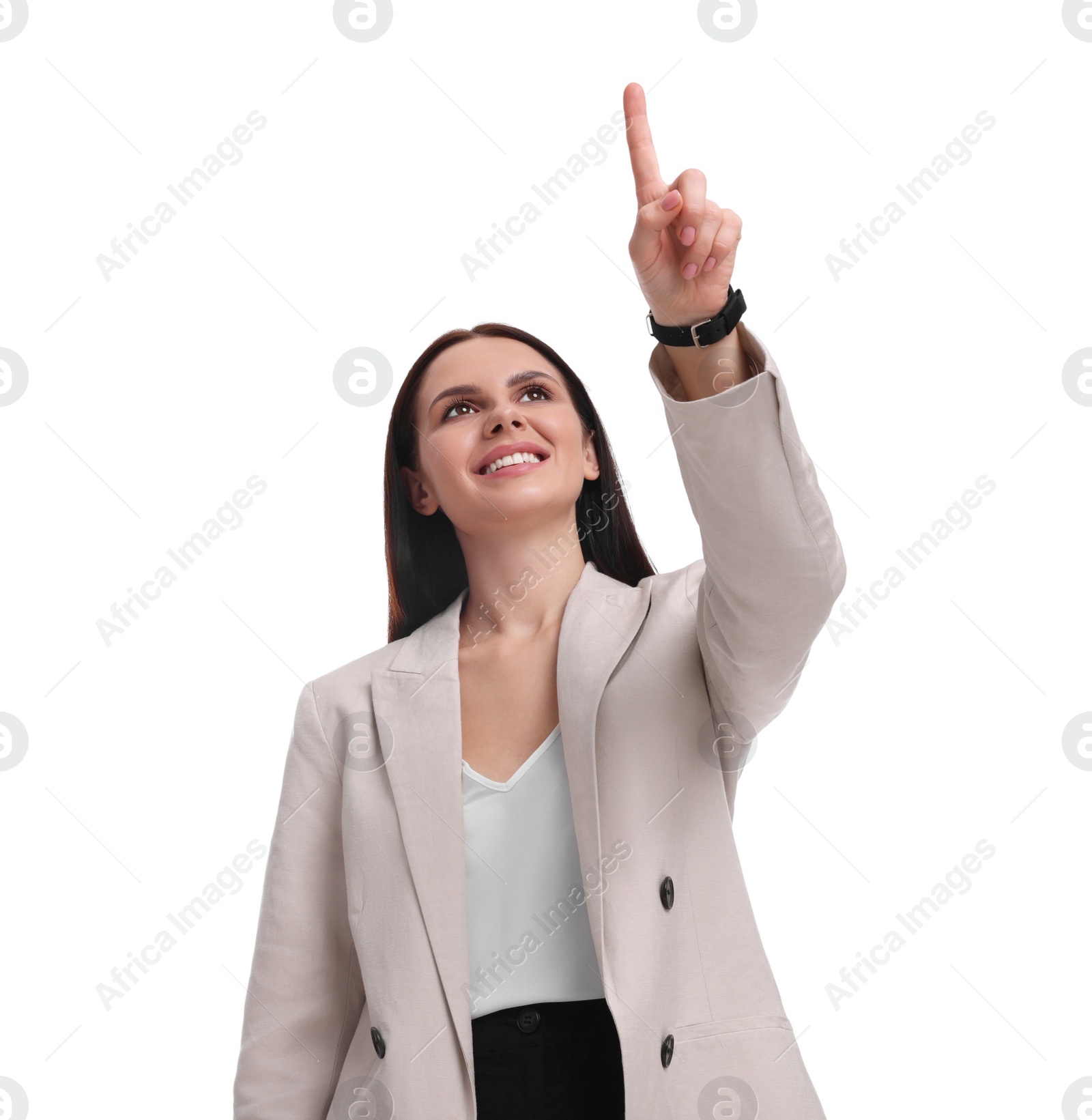 Photo of Beautiful businesswoman in suit pointing at something on white background, low angle view