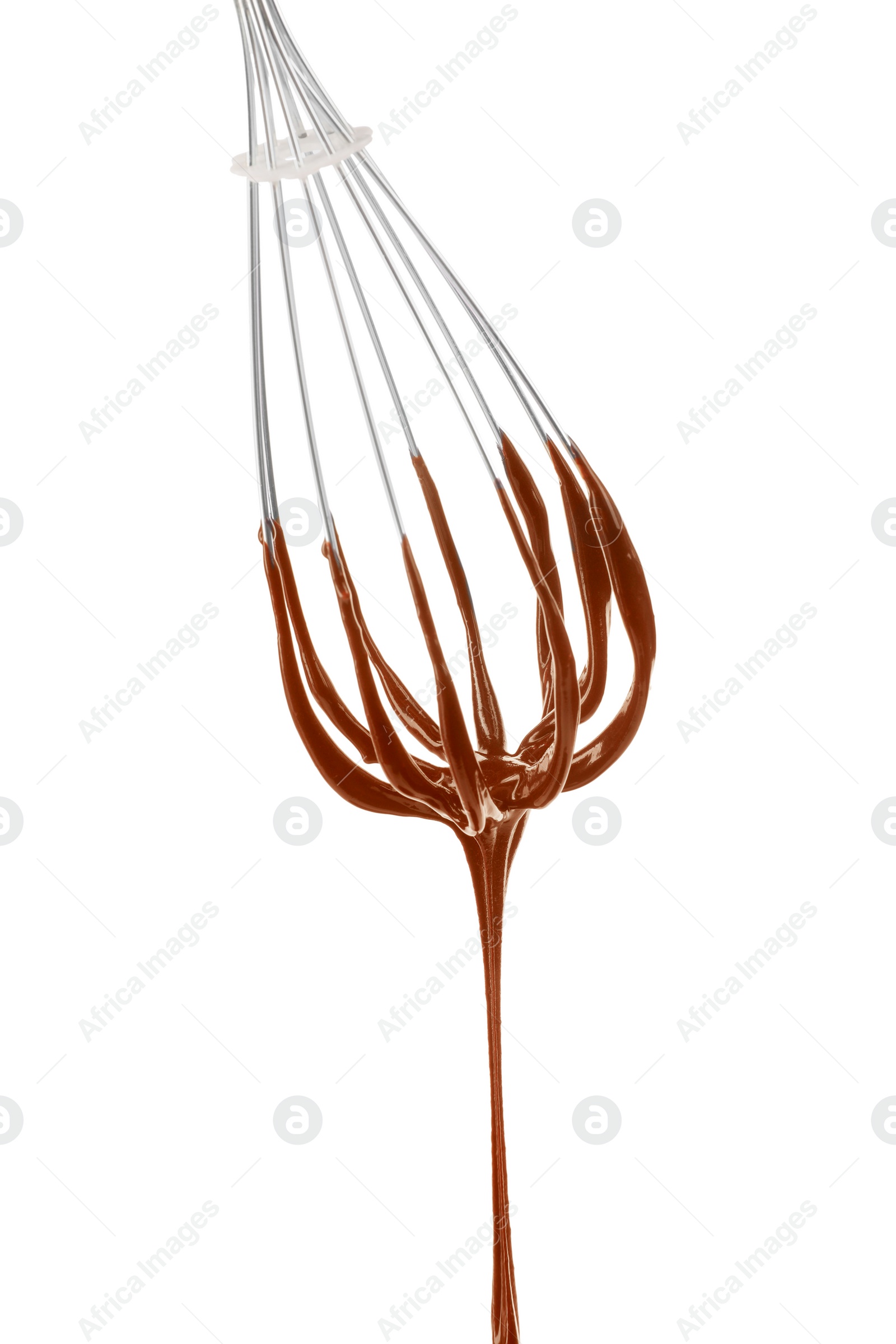 Photo of Chocolate cream flowing from whisk on white background