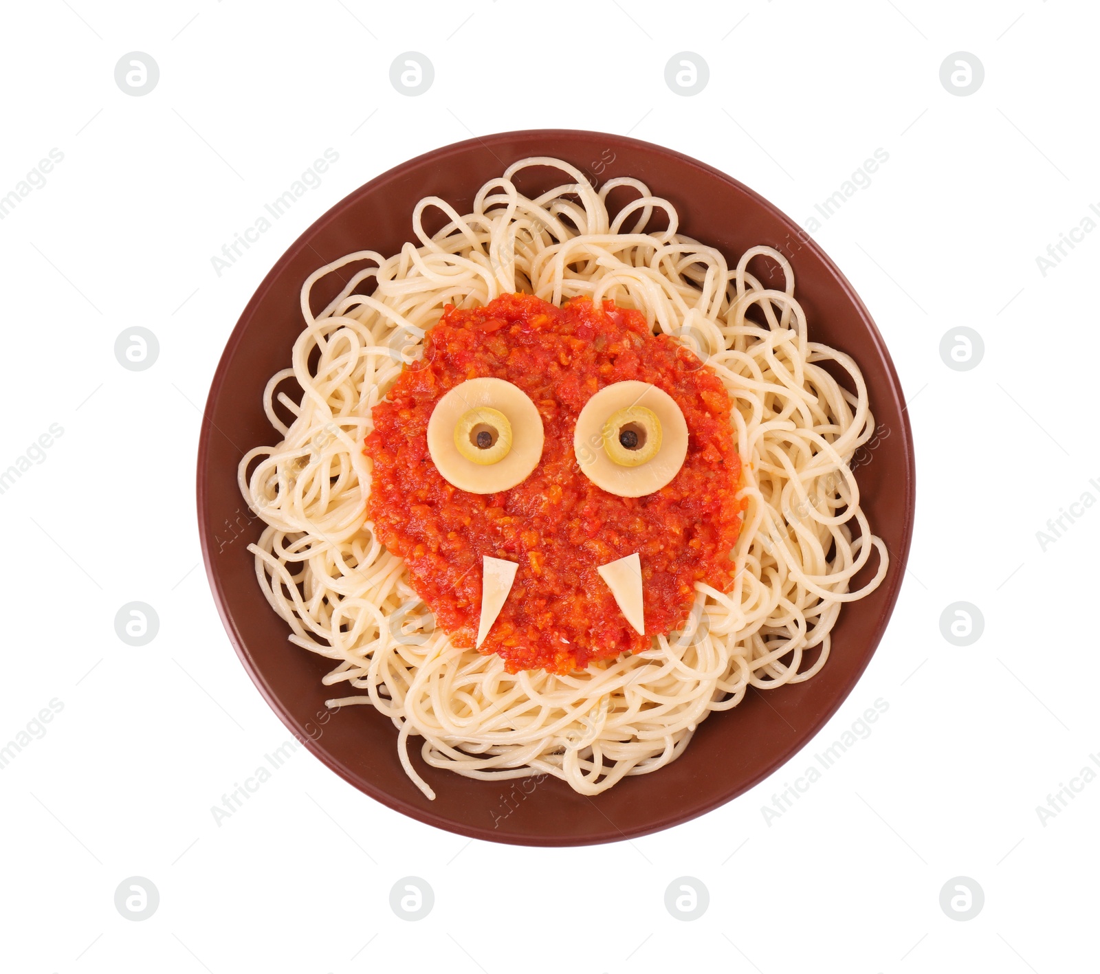 Photo of Plate with funny monster made of tasty pasta isolated on white, top view. Halloween food