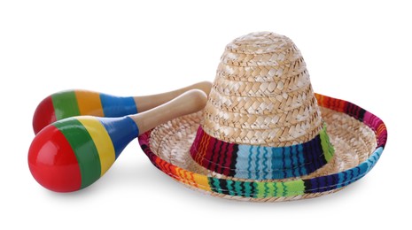 Photo of Colorful maracas and sombrero hat isolated on white. Musical instrument