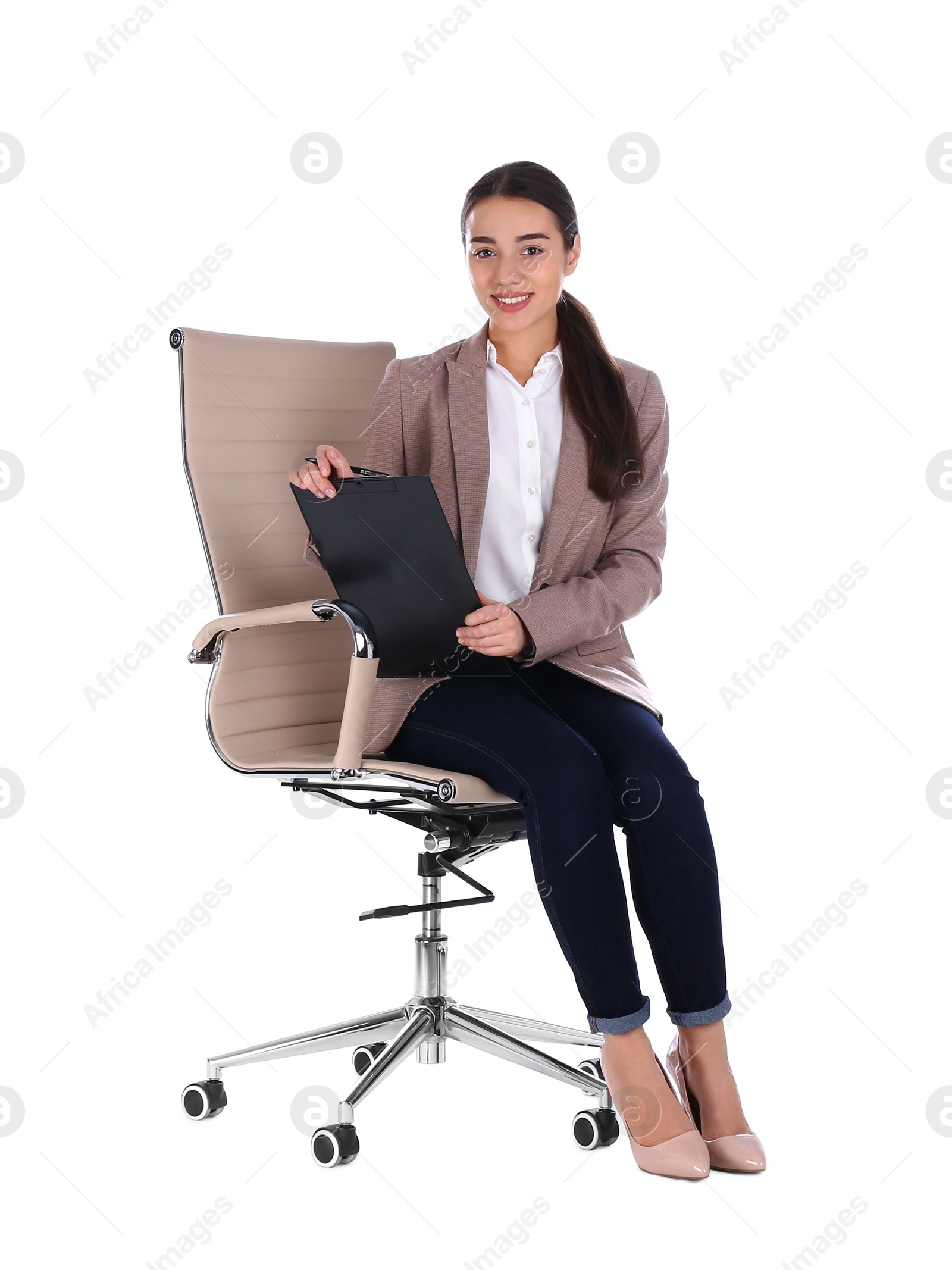 Photo of Young businesswoman sitting in armchair isolated on white