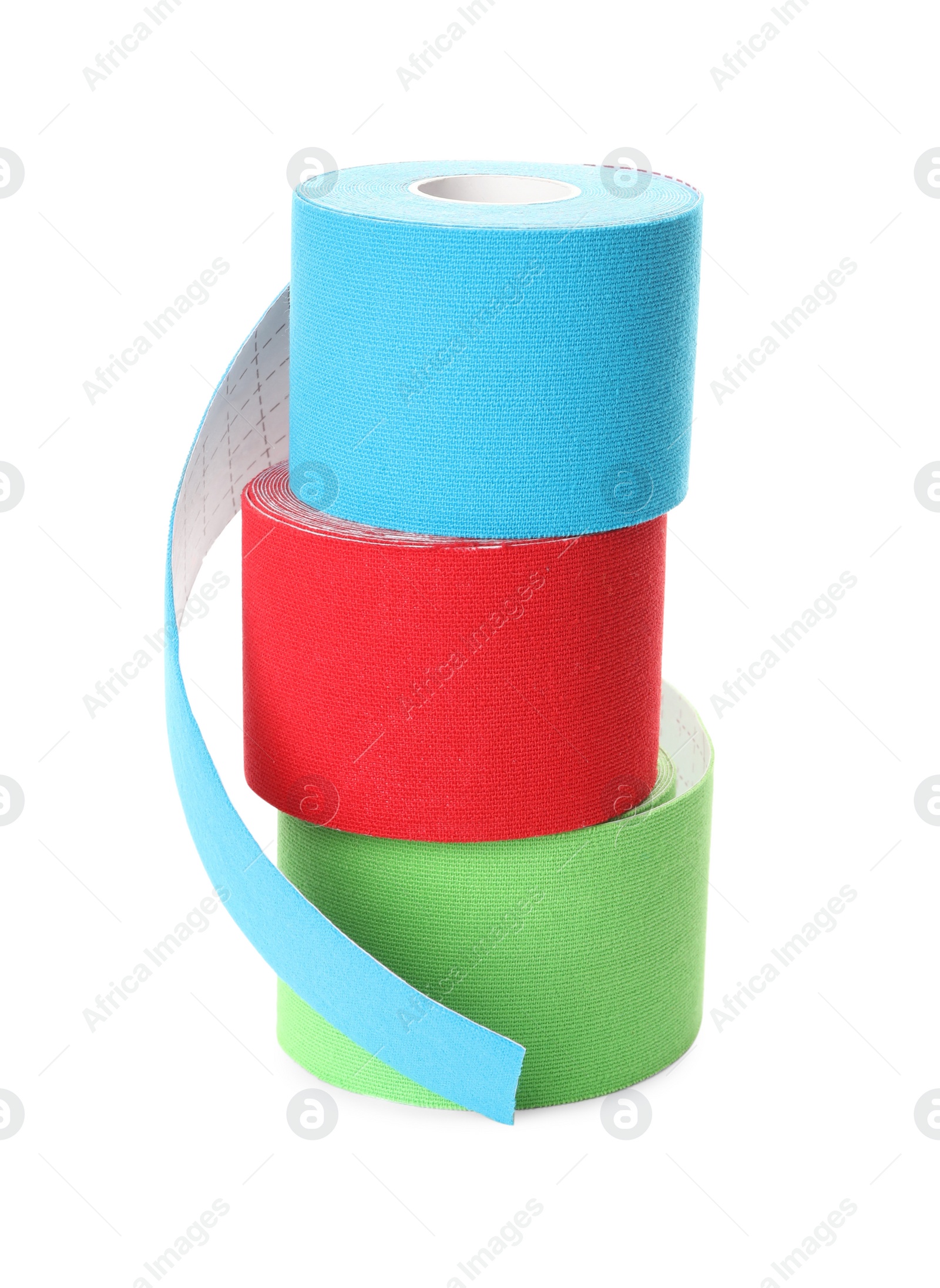 Photo of Many bright kinesio tape in rolls on white background