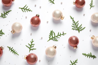 Flat lay composition with Christmas decorations on white background