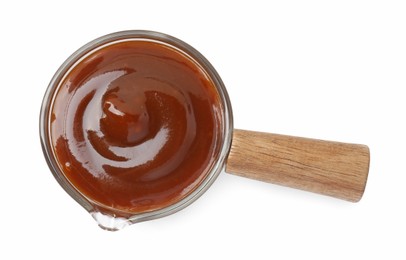 Tasty barbecue sauce in dish isolated on white, top view