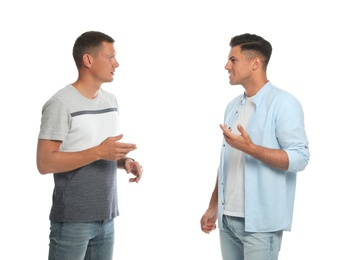 Photo of Men in casual clothes talking on white background