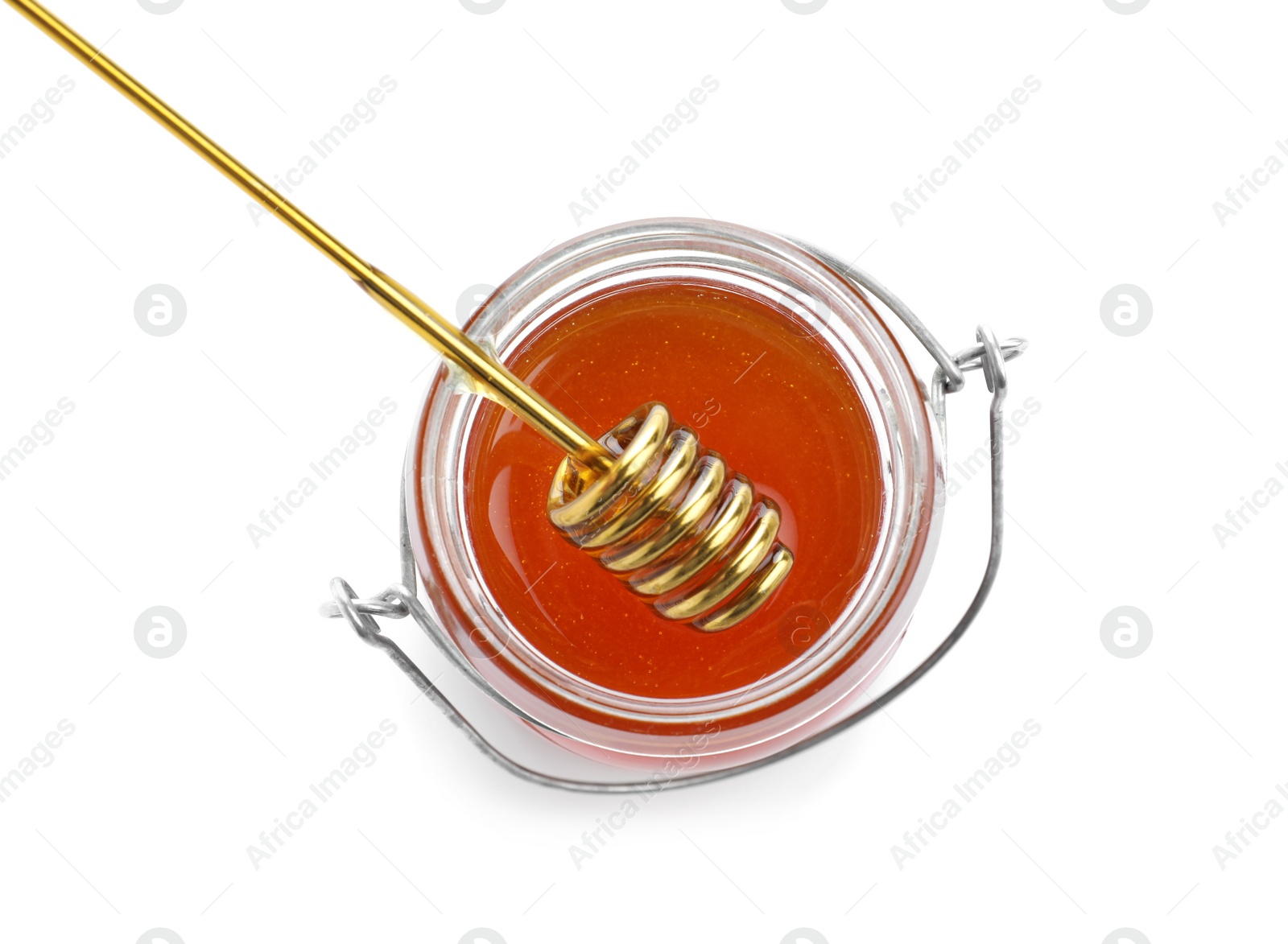 Photo of Jar of organic honey and dipper isolated on white, top view