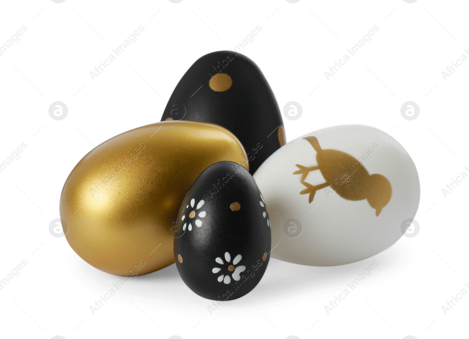 Photo of Many decorated Easter eggs isolated on white