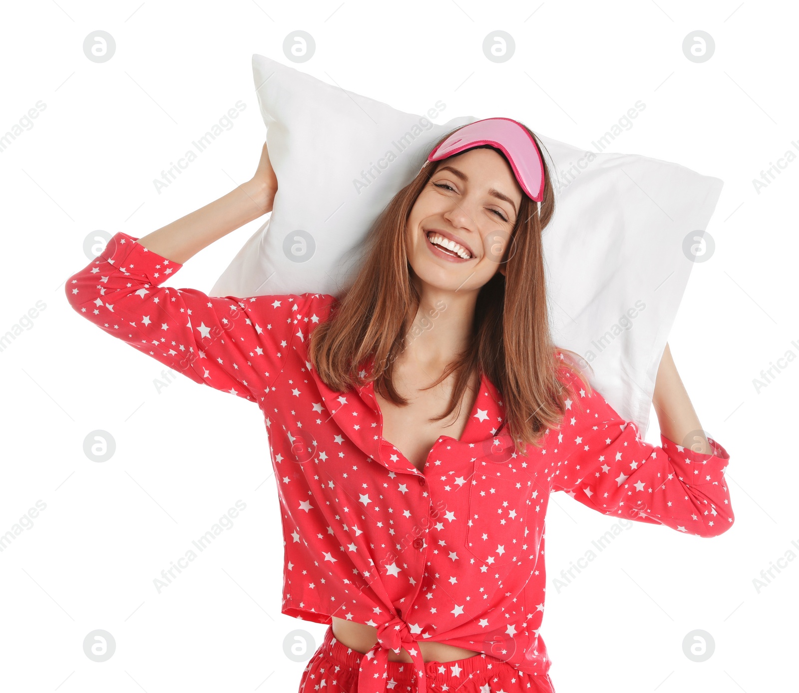 Photo of Beautiful woman with pillow and sleep mask on white background. Bedtime