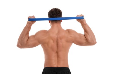 Photo of Young man exercising with elastic resistance band on white background, back view