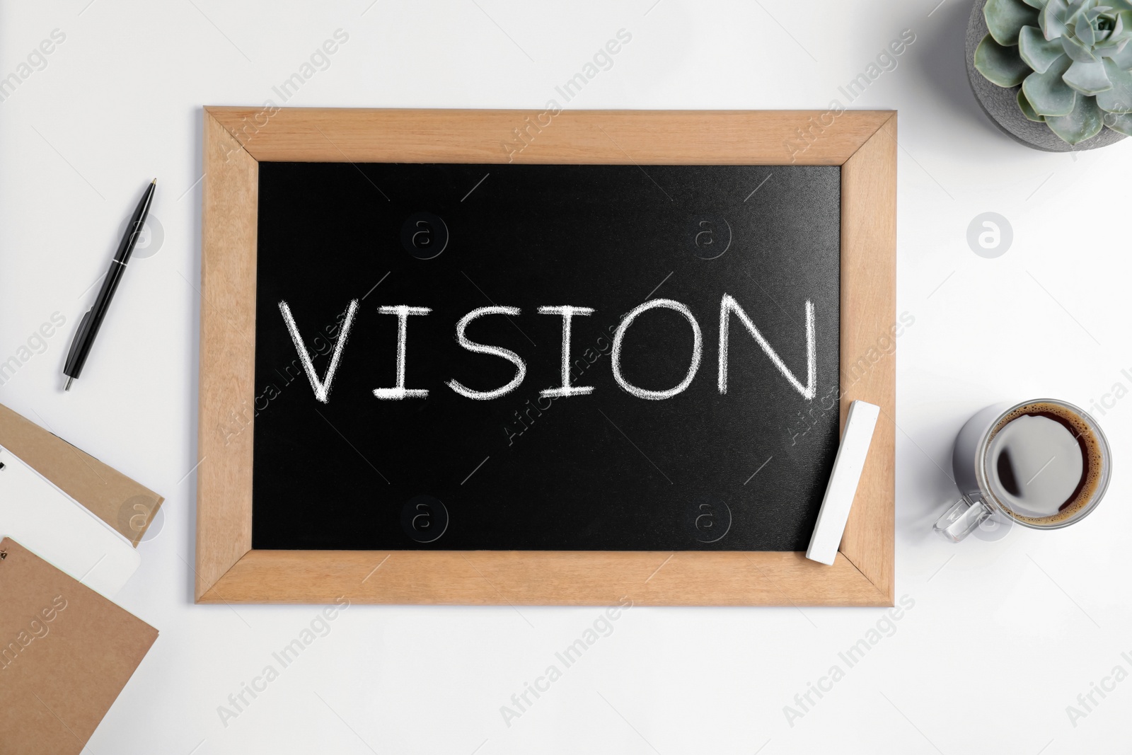 Image of Small chalkboard with word Vision on white background, flat lay