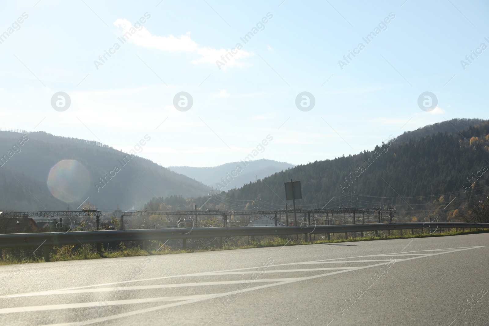 Photo of View of road and mountains on sunny day