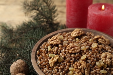 Photo of Traditional Christmas slavic dish kutia in bowl, closeup