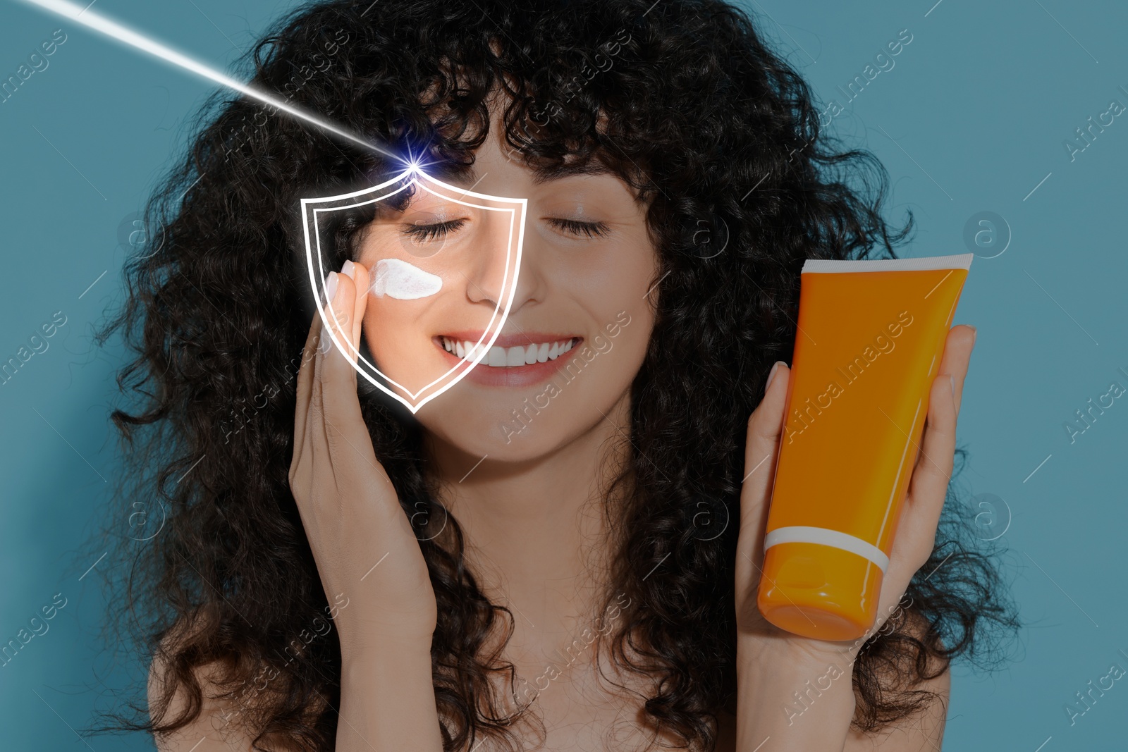 Image of Beautiful woman applying sunscreen onto face against light blue background. Illustration of shield symbolizing sun protection