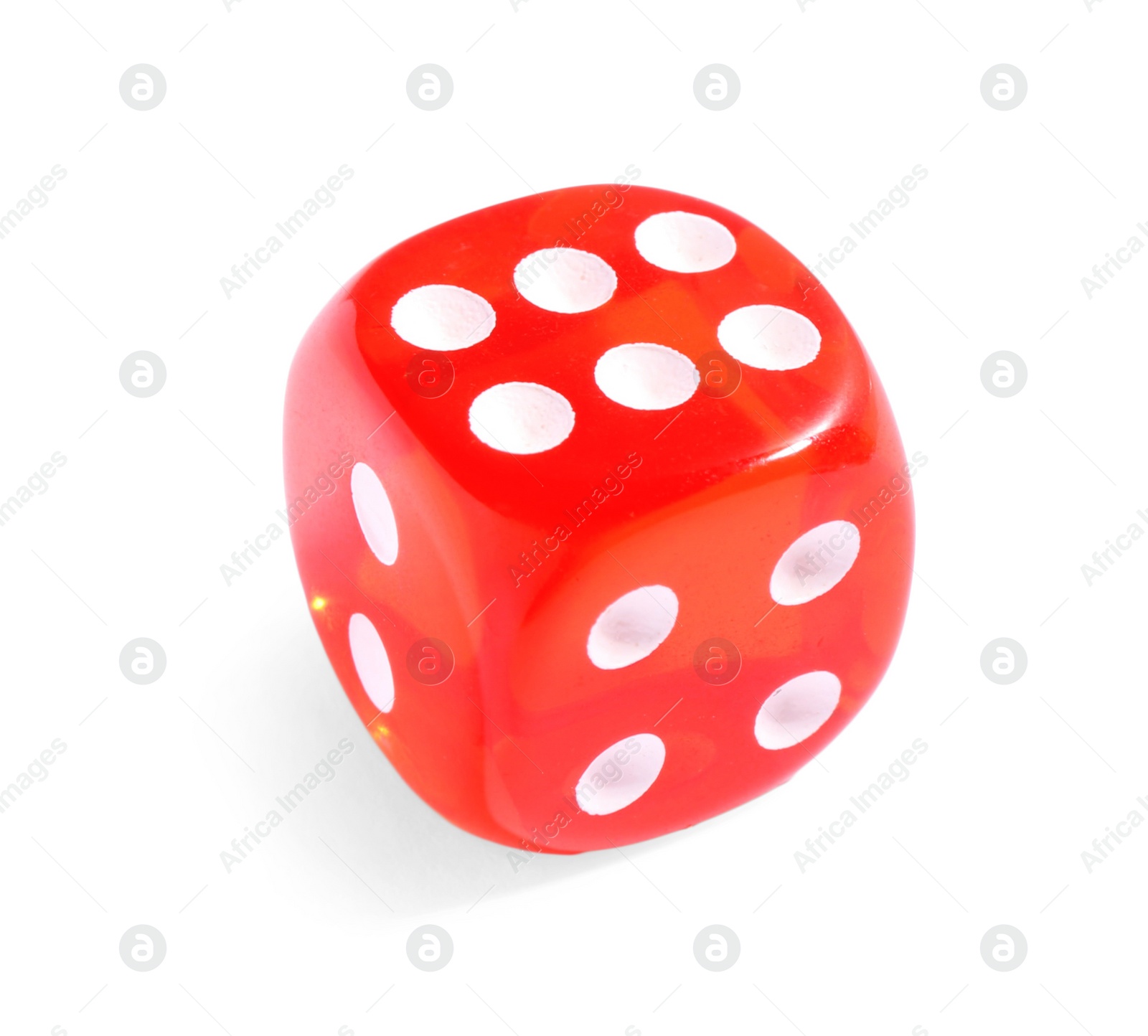 Photo of One red game dice isolated on white