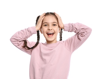 Portrait of little girl laughing on white background