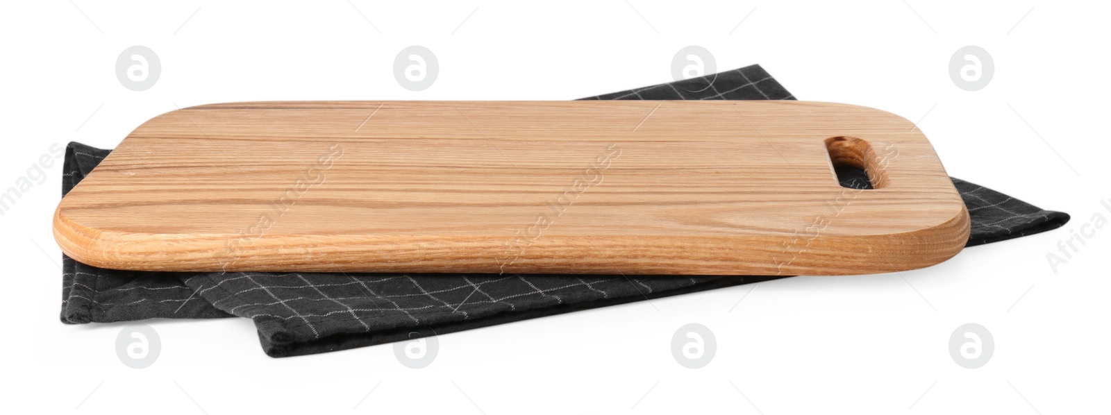 Photo of Wooden cutting board and checkered towel on white background