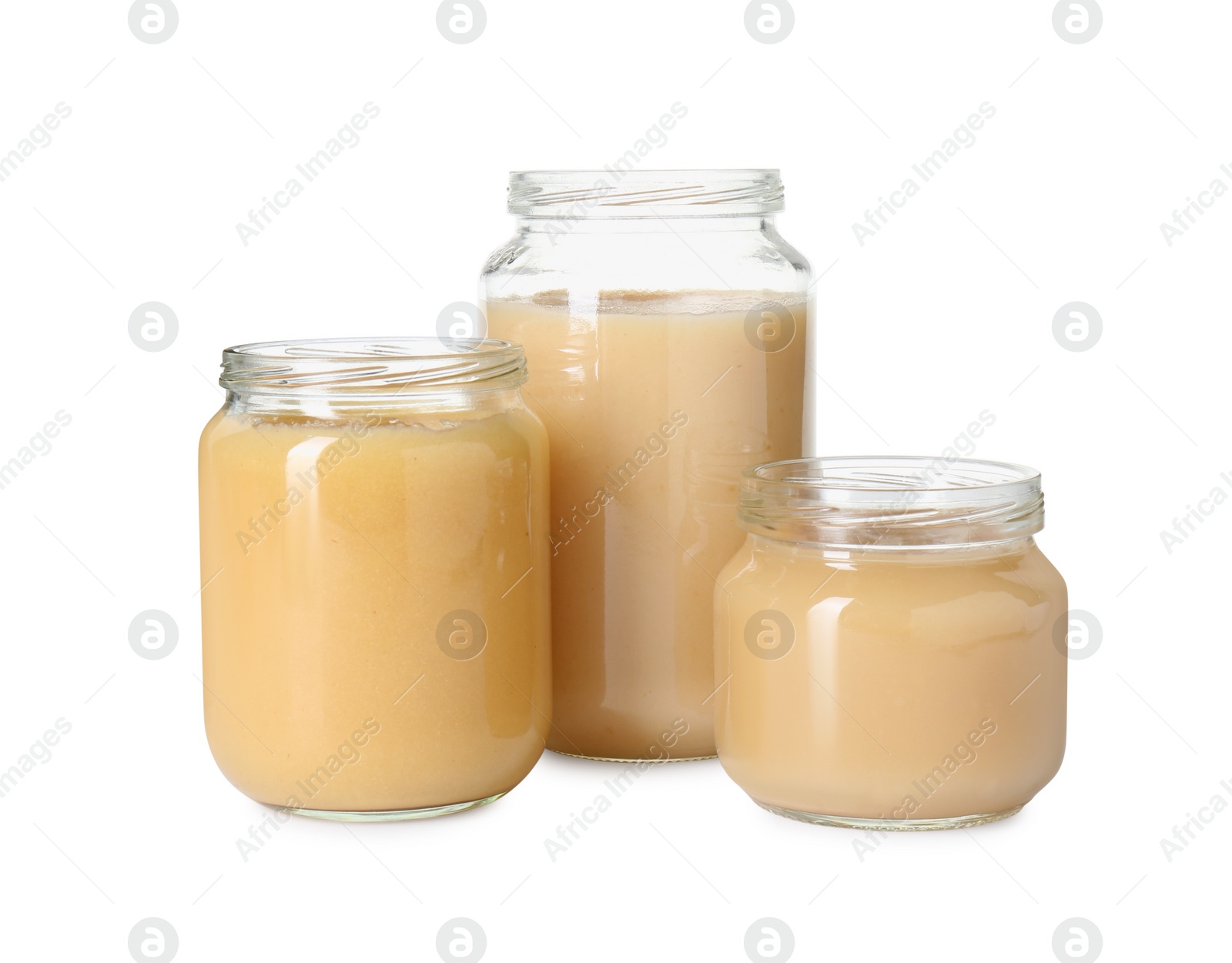 Photo of Baby food. Tasty healthy puree in jars isolated on white