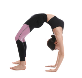 Professional young acrobat exercising on white background