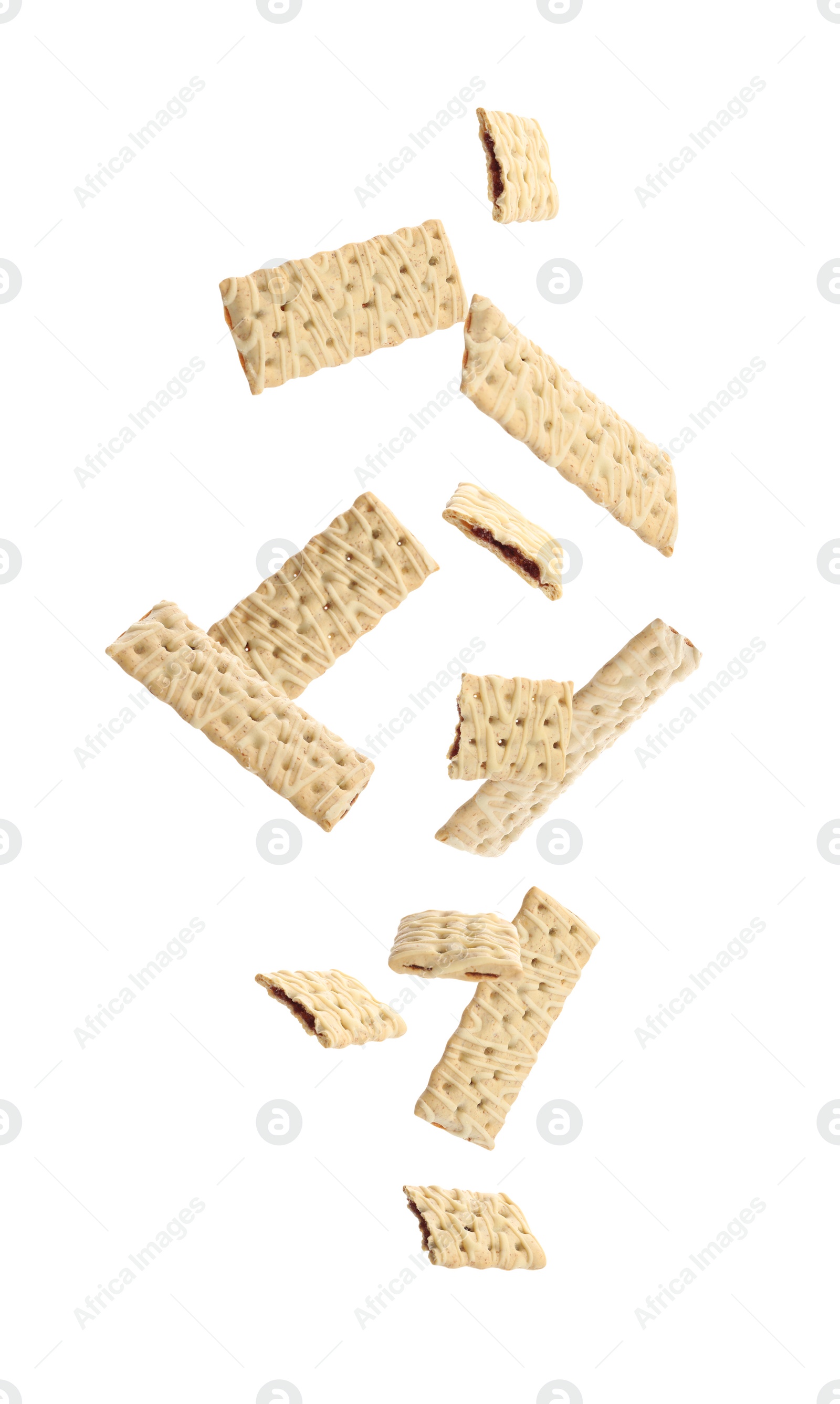 Image of Set of falling delicious cookies with filling on white background 