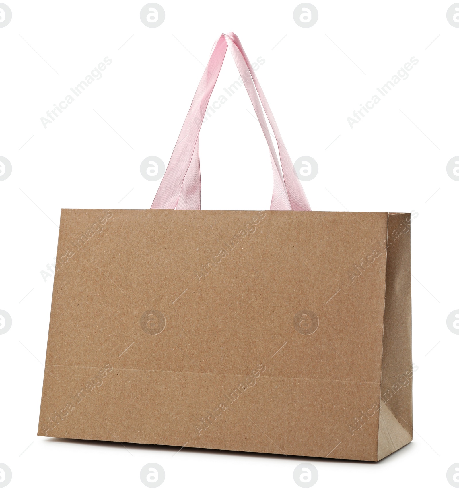 Photo of Paper shopping bag with handles on white background. Mockup for design