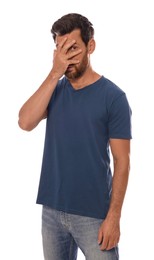 Photo of Upset man covering face with hand on white background