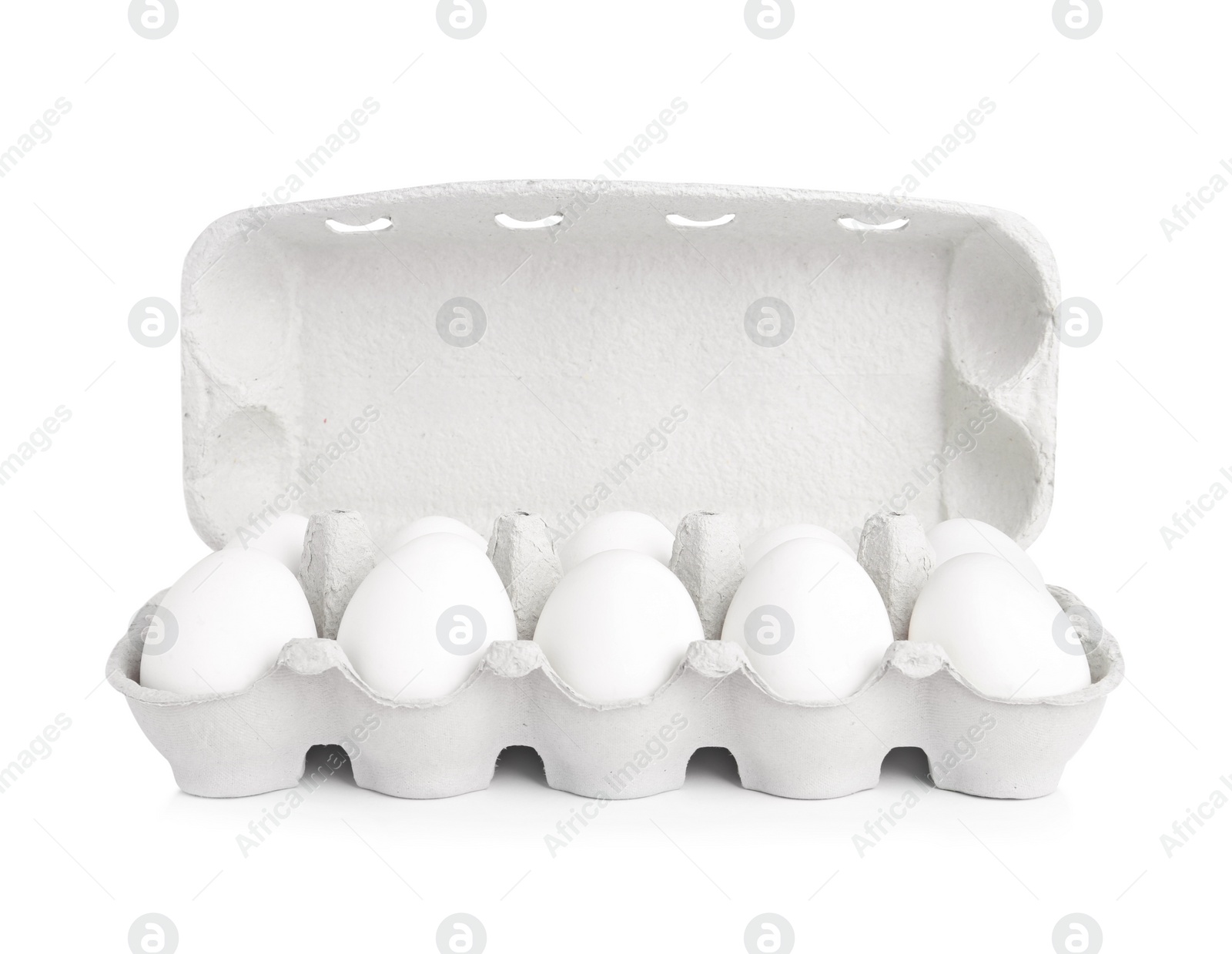 Photo of Chicken eggs in cardboard box isolated on white