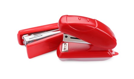 Photo of Two new bright staplers isolated on white