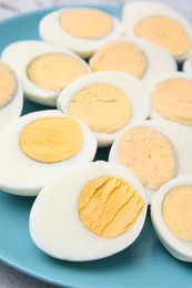 Plate with fresh hard boiled eggs, closeup