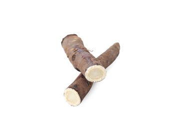 Photo of Fresh raw salsify roots on white background