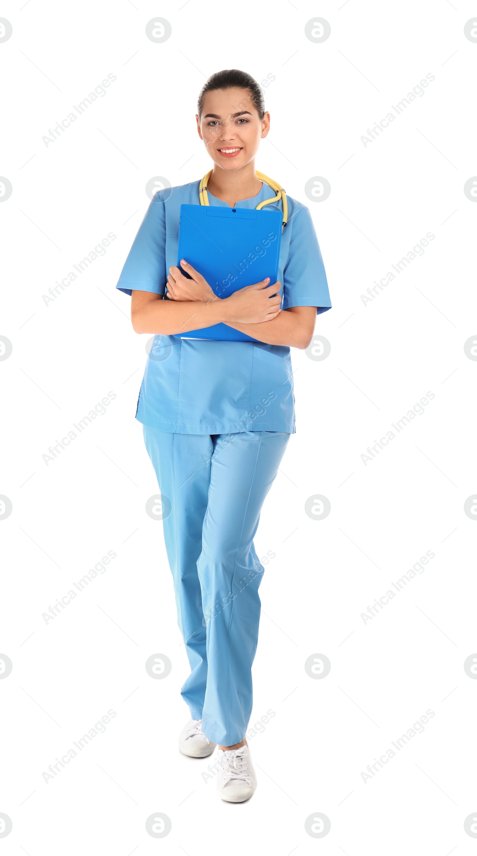 Photo of Full length portrait of young medical assistant with stethoscope and clipboard on white background