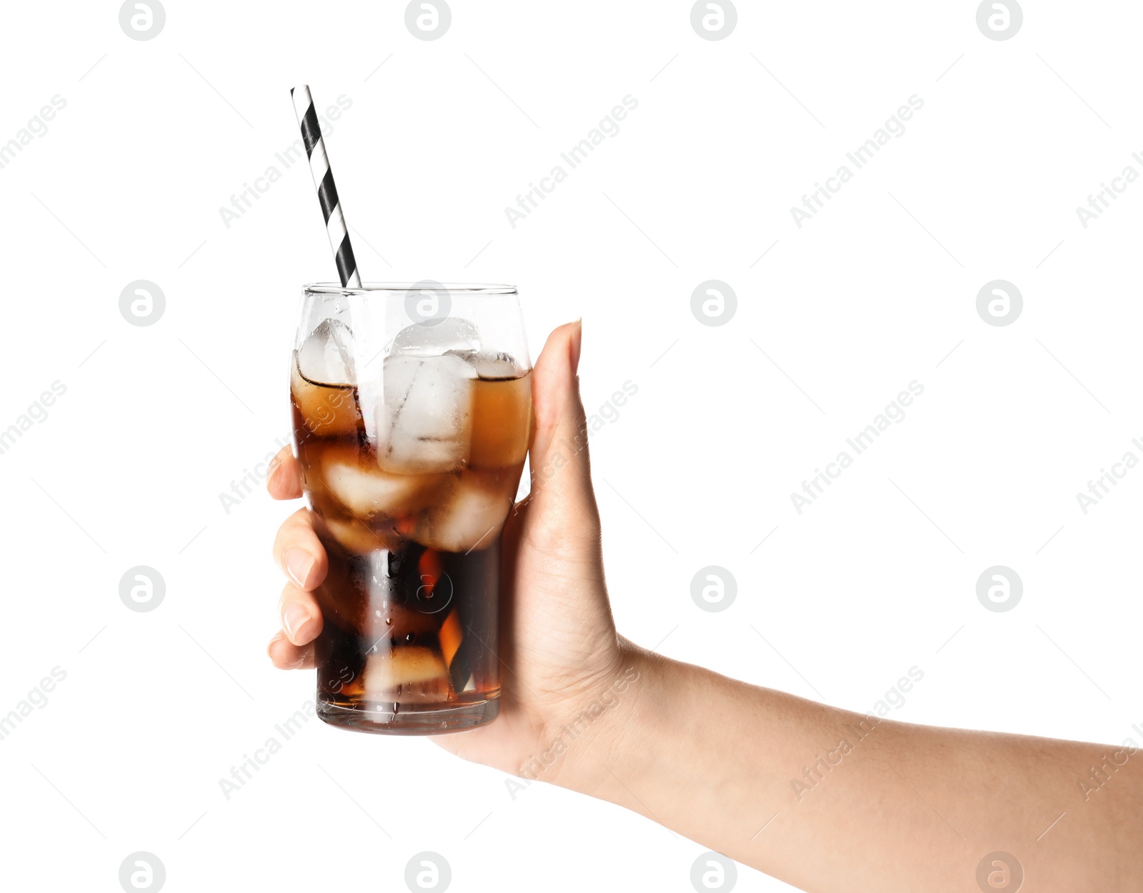 Photo of Woman holding glass of refreshing cola with ice on white background, closeup