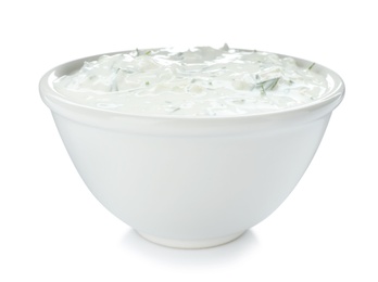 Photo of Bowl with cucumber sauce on white background