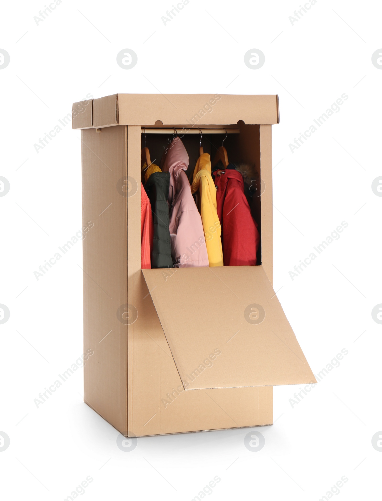 Photo of Cardboard wardrobe box with clothes on white background