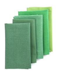 Photo of Many fabric napkins for table setting on white background, top view