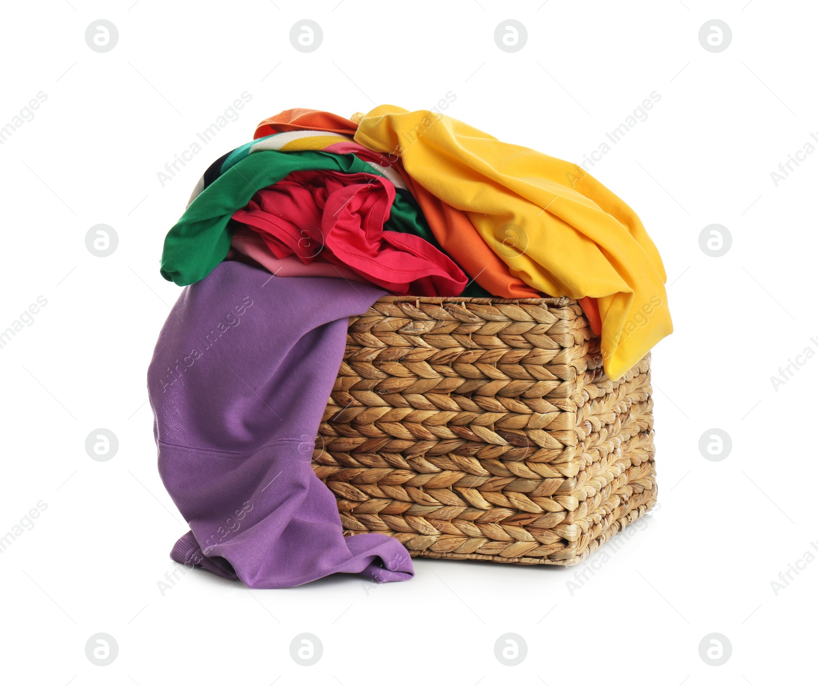 Photo of Wicker laundry basket with different clothes isolated on white