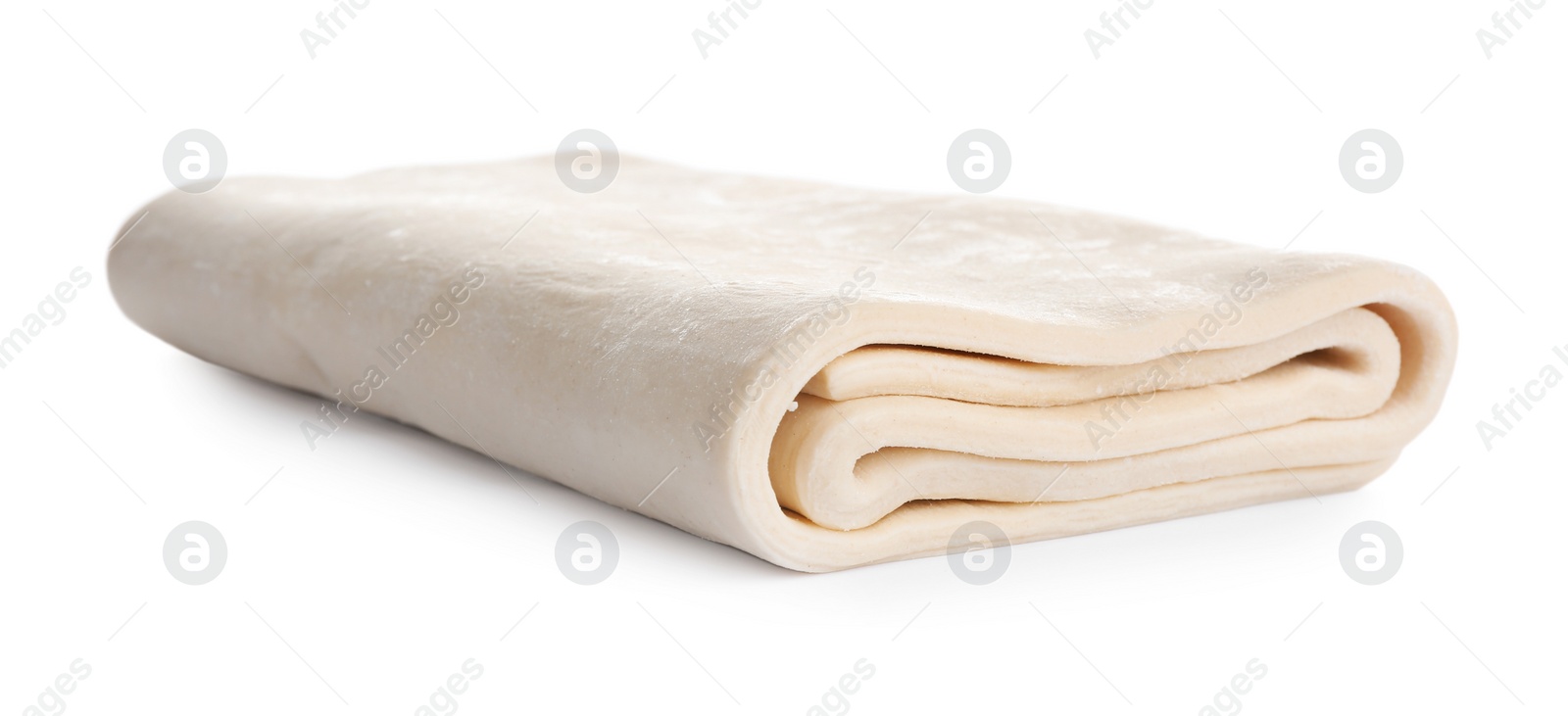 Photo of Fresh dough on white background. Puff pastry