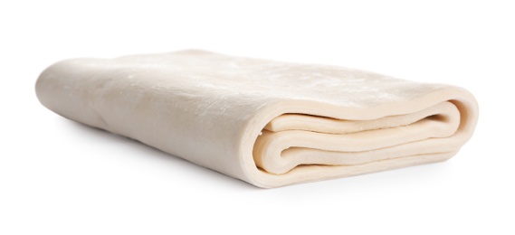 Photo of Fresh dough on white background. Puff pastry