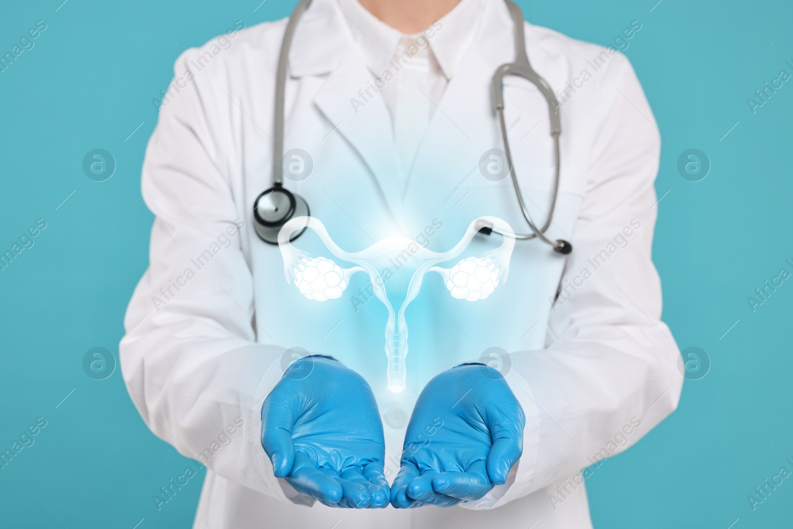 Image of Doctor and illustration of female reproductive system on light blue background, closeup