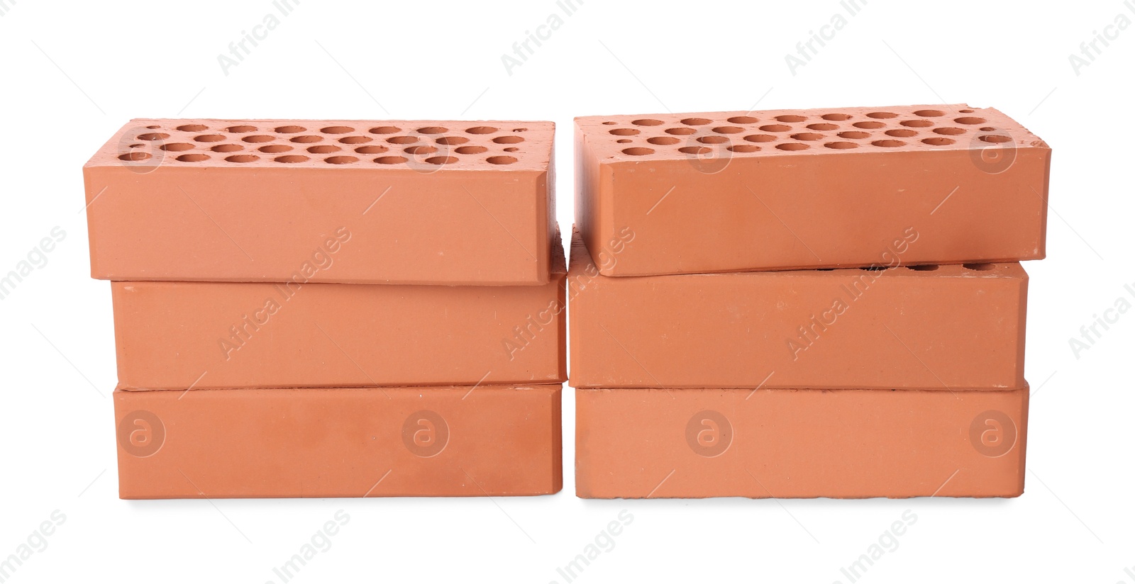 Photo of Many red bricks on white background. Building material