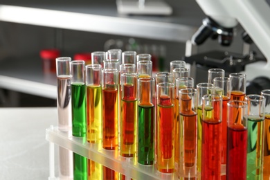 Photo of Test tubes with samples in chemistry laboratory, closeup