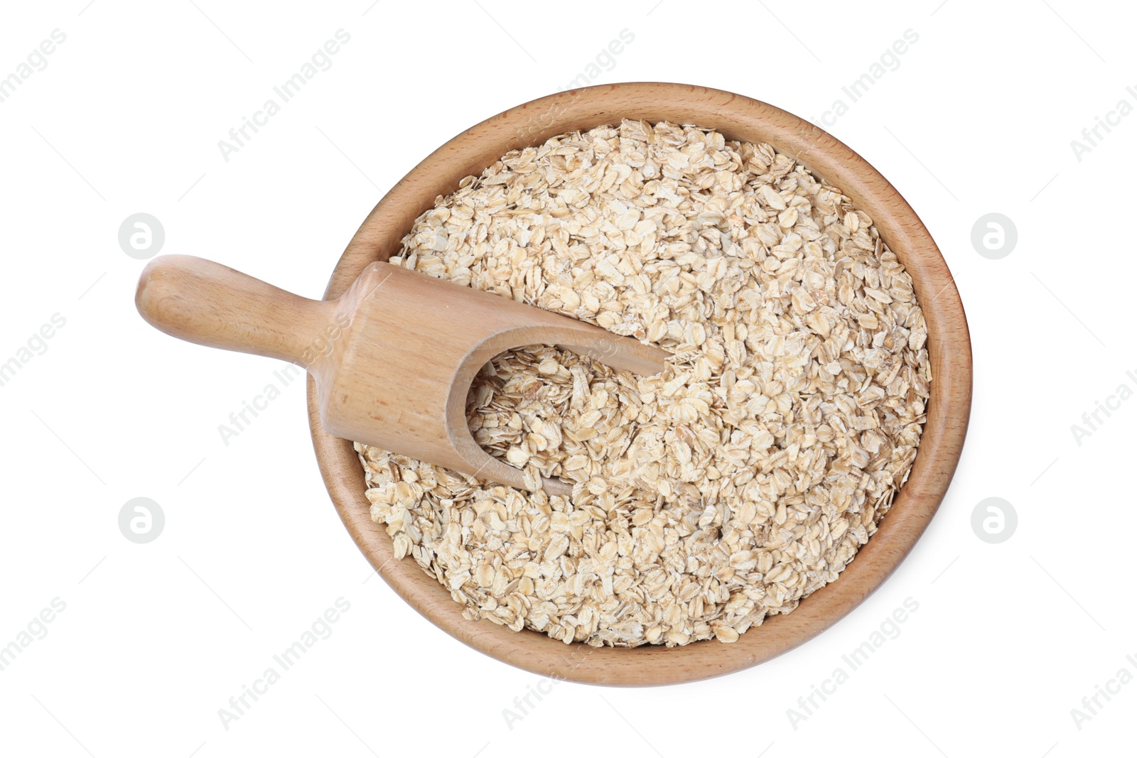 Photo of Oatmeal, wooden bowl and scoop on white background, top view