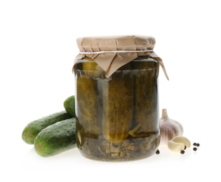 Photo of Jar of pickled cucumbers and fresh ingredients on white background