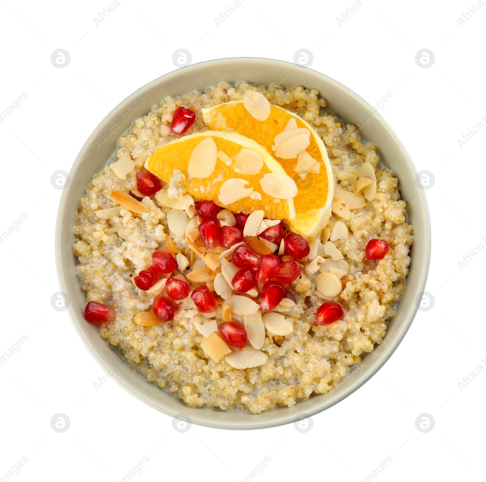 Photo of Bowl of quinoa porridge with nuts, orange and pomegranate seeds on white background, top view