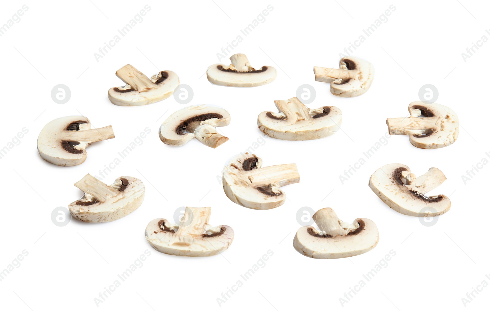 Photo of Cut mushrooms as layer for pizza isolated on white