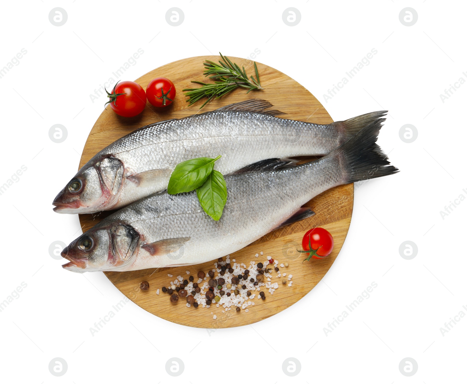 Photo of Tasty sea bass fish and ingredients isolated on white, top view