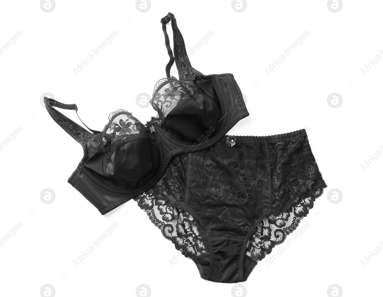 Photo of Elegant black plus size women's underwear on white background, top view